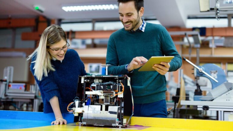 young-students-of-robotics-preparing-robot-for-testing-e1706480867363